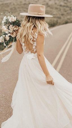 القبعة بدلاً من طرحة الزفاف لإطلالة كلاسيكية جذابة