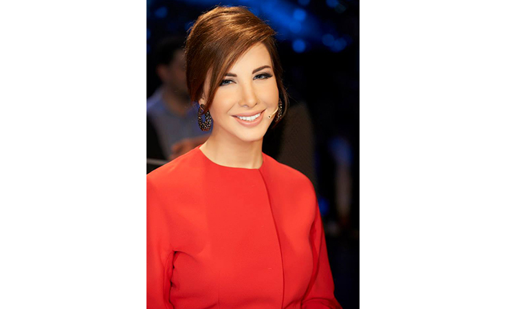 بين نانسي عجرم ونوال الزغبي غزل، كليب ومخرج