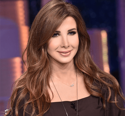 استوحي تسريحات شعركِ في ليلة رأس السنة من نانسي عجرم