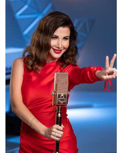 تعرّفي على سعر فستان نانسي عجرم الأحمر بـ The Voice Kids