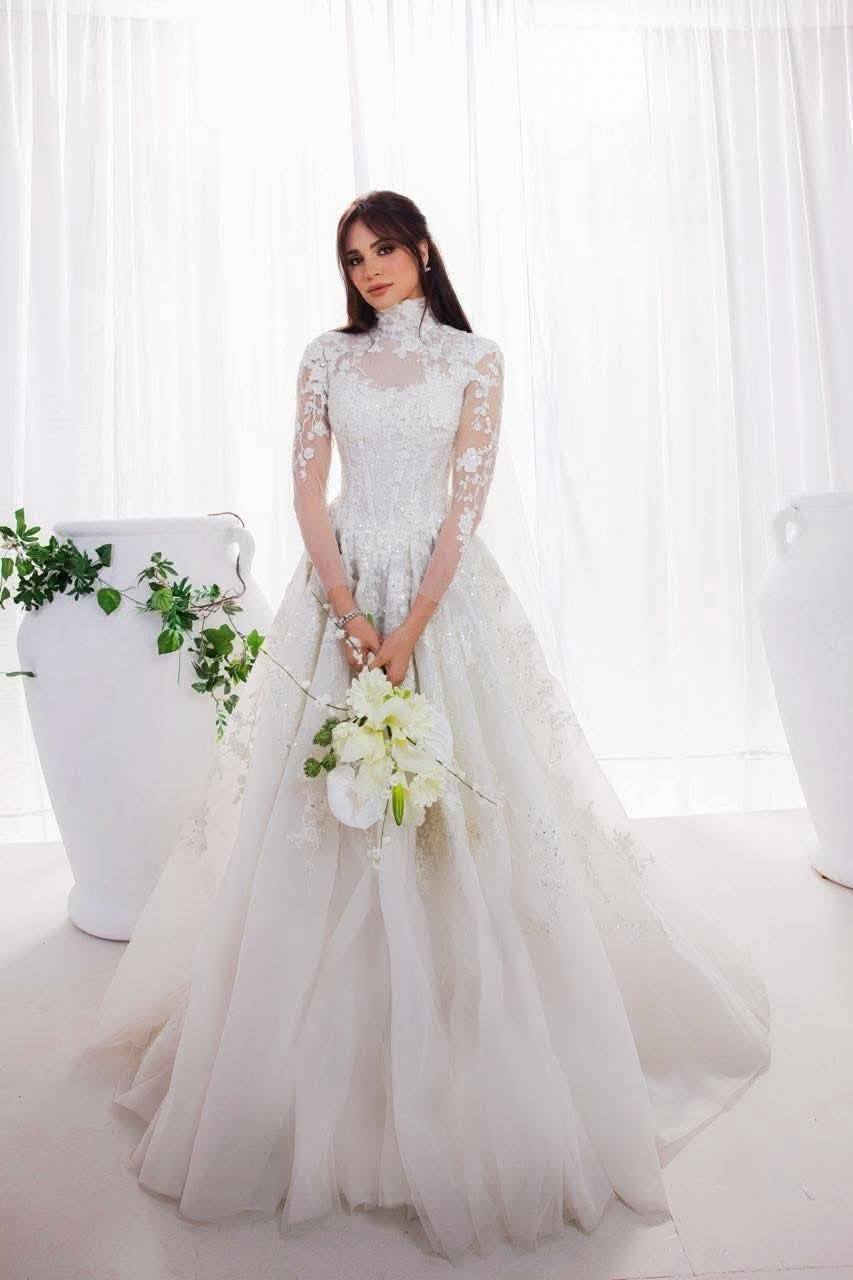 صورة رومانسية تجمع بين أمال ماهر وزوجها علي محجوب