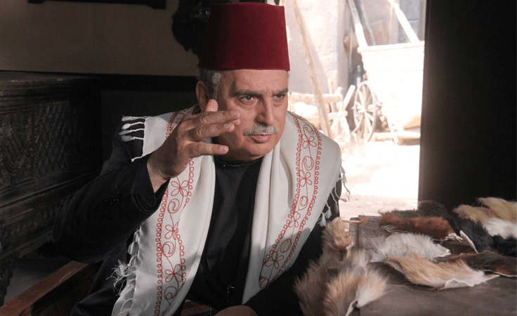 خاص - ما قصّة الطفل الذي تبنّاه عباس النوري.. ومن هو تاج الشام؟