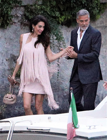 أمل علم الدين تلهمنا إطلالة الـGatsby باللون الزهري