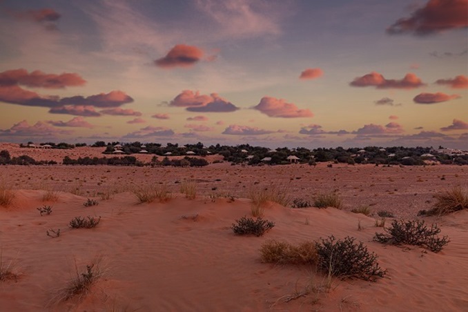 احتفلي بروح الاتحاد بين كثبان الصحراء في منتجع المها الفاخر