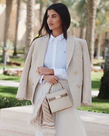 علا فرحات وفيصل الغزّاوي ينبضان بأناقة عصرية في حملة تومي هيلفيغر