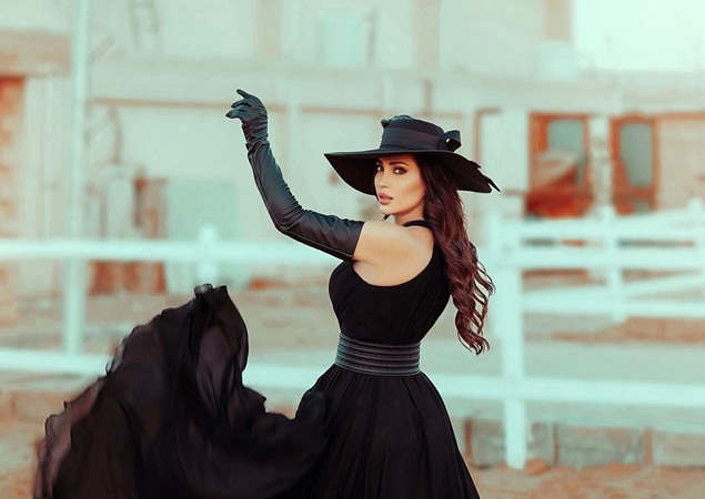 نسرين طافش توضح سبب إخفاء وجه زوجها