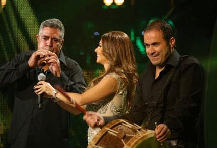 جيجي لامارا يهدد بسحب نانسي من Arab Idol