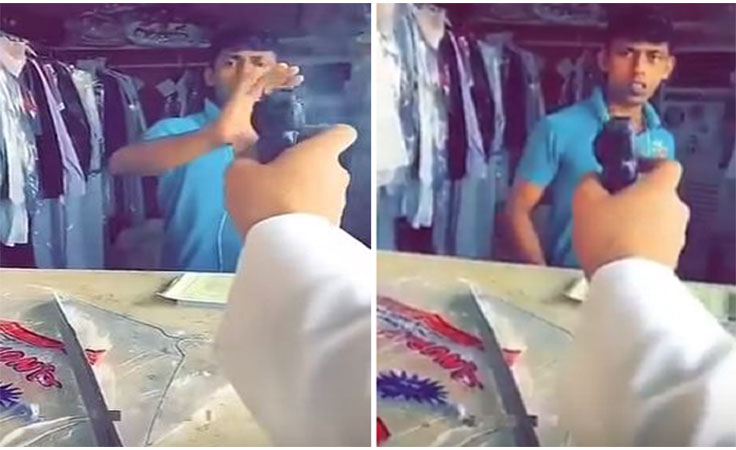 بالفيديو شاب سعودي يمزح مع عامل هندي برفع المسدس فى وجهه