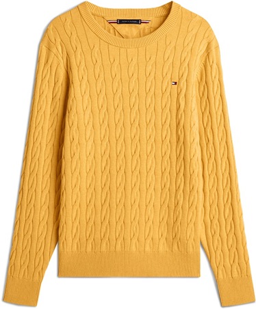 لمسة تومي هيلفيغر التي ستُحوّل أعيادك إلى عرض أزياء