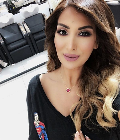 صورة.. رويدا عطية ونجلها بنفس الإطلالة!