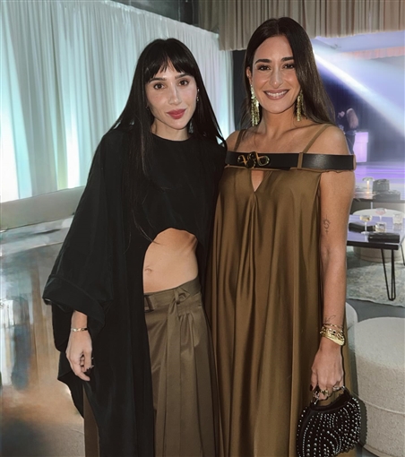 أحدث ظهور لأمينة خليل وزوجها خلال فعاليات عالم الموضة في دبي